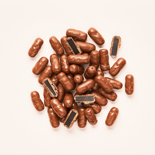 Milk Liquorice Bullets - Coated Australia